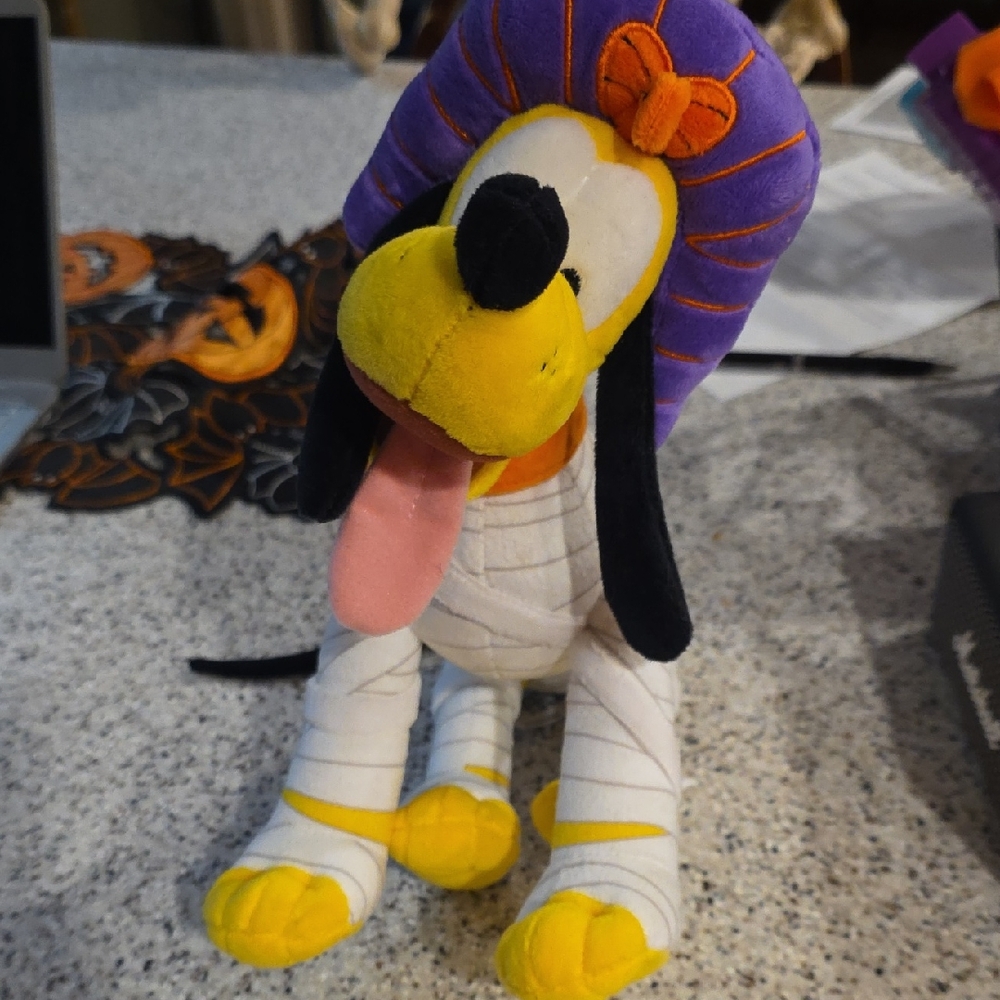 Pluto As Mummy